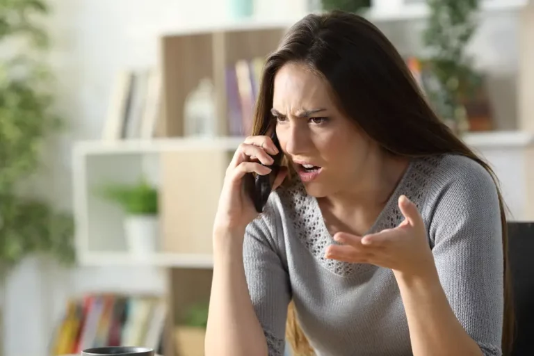 woman on phone upset
