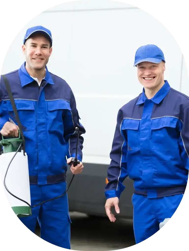 two Crane Pest Control workers standing together
